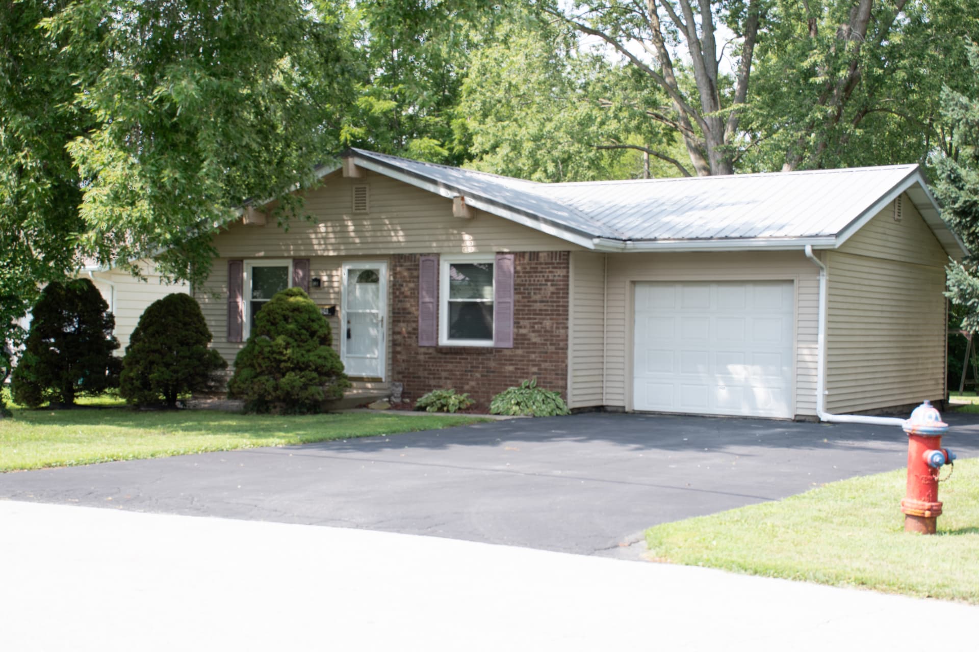 Front exterior of a home photographed for a real estate listing